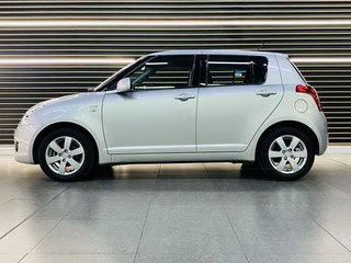 2009 Suzuki Swift 1.5 GLS - photo 6